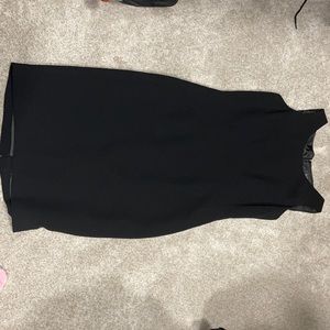 Little black dress falls just below knee. Beautiful and versatile!